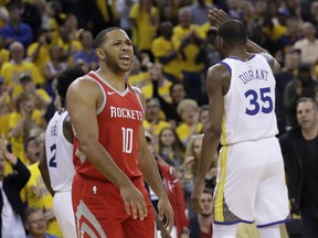 Houston Rockets guard Eric Gordon (10) reacts during the second half of Game 6 of the NBA basketball Western Conference Finals against the Golden State Warriors in Oakland, Calif., Saturday, May 26, 2018.
