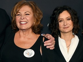 In this March 23, 2018 file photo,  Roseanne Barr and Sara Gilbert arrive at the Los Angeles premiere of "Roseanne" in Burbank, Calif. (Jordan Strauss/Invision/AP, File)