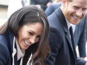 In this file photo dated Thursday March 8, 2018, Britain's Prince Harry and his fiancee Meghan Markle arrive for an event for young women, as part of International Women's Day in Birmingham, central England. Canadian expats in London are celebrating the royal wedding, and empathizing with Markle's move.