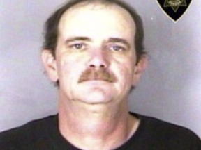 This undated file booking photo provided by the Marion County, Ore., Sheriff's Department shows Stephen Houk. Houk, a paroled sex offender. (Marion County Sheriff's Department via AP, File)