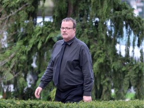 John Paul Stone walks toward the Perth County Courthouse on Friday May 11, 2018 in Stratford, Ont.