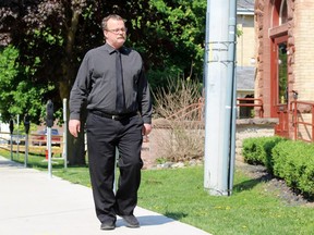 John Paul Stone walks towards the Perth County Courthouse on Thursday May 24, 2018 in Stratford, Ont. Terry Bridge/Stratford Beacon Herald/Postmedia Network