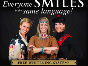 A full-page ad featuring cultural clothing with the line "Free Whitening System" from Renaissance Dental Center in Raleigh, N.C.