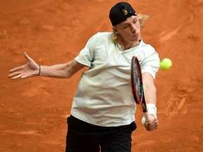 Denis Shapovalov returns the ball to Kyle Edmund during their Madrid Open quarterfinal match at the Caja Magica in Madrid on May 11, 2018. (Getty Images)