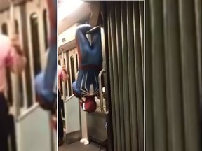 A Twitter user captured video of a person dressed as Spider-man hanging around on a Boston train. (Twitter/ashhauck)
