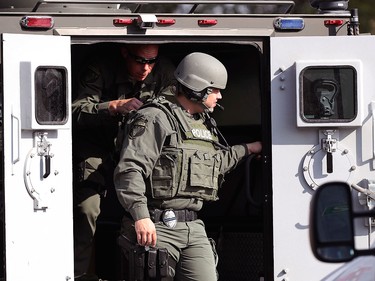 Law enforcement officers respond to an active shooter in front of Santa Fe High School Friday, May 18, 2018, in Santa Fe, Texas.