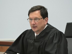 In this March 21, 2016, file photo, Judge Thomas Estes presides in Eastern Hampshire District Court in Belchertown, Mass.