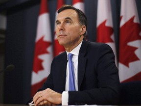 Finance Minister Bill Morneau speaks about the Trans Mountain Expansion project at a press conference in Ottawa on May 16, 2018.