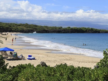 This undated photo provided by Kirk Lee Aeder shows Hapuna Beach in Hawaii. The beach is No. 8 on the list of best beaches for the summer of 2018 compiled by Stephen Leatherman, also known as Dr. Beach, a professor at Florida International University.
