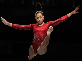 Sabrina Vega of the USA competes on the Beam apparatus in the Women's qualification during the day two of the Artistic Gymnastics World Championships Tokyo 2011 at Tokyo Metropolitan Gymnasium on Oct. 8, 2011 in Tokyo, Japan.