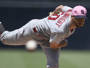 St. Louis Cardinals pitcher Adam Wainwright throws to San Diego Padres' Travis Jankowski in San Diego, Sunday, May 13, 2018.