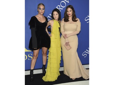 Jasmine Sanders, from left, designer Vera Wang and Ashley Graham arrive at the CFDA Fashion Awards at the Brooklyn Museum on Monday, June 4, 2018, in New York.