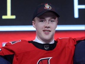Jacob Bernard-Docker poses after being selected 26th overall by the Ottawa Senators on Friday, June 22, 2018.