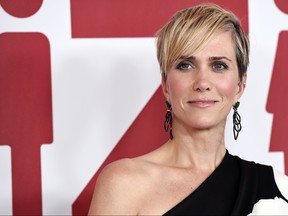 In this Dec. 18, 2017, file photo, Kristen Wiig, a cast member in "Downsizing," poses at a special screening of the film at the Regency Village Theatre in Los Angeles. (Chris Pizzello/Invision/AP, File)