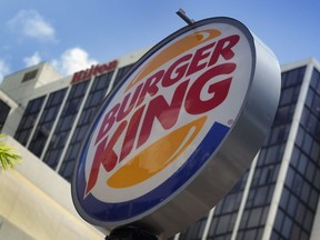 A Burger King sign hangs outside a restaurant as reports indicate the company may be considering a sale of itself on September 1, 2010 in Miami, Florida.
