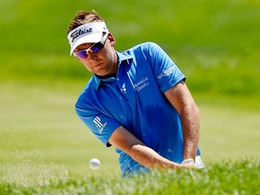 Ian Poulter of England plays his shot out of the bunker on the second hole during the final round of the RBC Canadian Open at Glen Abbey Golf Club on July 30, 2017 in Oakville, Canada. (Minas Panagiotakis/Getty Images)