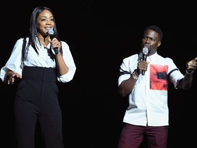 Actors Tiffany Haddish (L) and Kevin Hart speak onstage during CinemaCon 2018 Universal Pictures Invites You to a Special Presentation Featuring Footage from its Upcoming Slate at The Colosseum at Caesars Palace during CinemaCon, the official convention of the National Association of Theatre Owners, on April 25, 2018 in Las Vegas, Nevada.