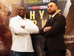 Dillian Whyte and Joseph Parker pose for photographs after their Press Conference at The Dorchester Hotel on June 7, 2018 in London, England. (Naomi Baker/Getty Images)