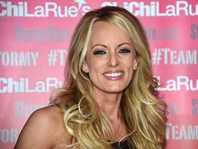Adult film star Stormy Daniels poses at Chi Chi Larue's adult entertainment store in West Hollywood, California on May 23, 2018. (Robyn Beck/Getty Images)
