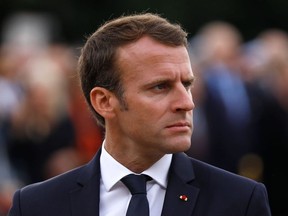 French President Emmanuel Macron attends a ceremony commemorating General Charles De Gaulle's June 1940 appeal for French resistance against Nazi Germany, at the Mont Valerien National Memorial in Suresnes on the outskirts of Paris on June 18, 2018.