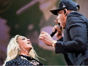 This file photo taken on November 4, 2016 shows Beyonce (L) and Jay Z perform during a Get Out the Vote (GOTV) performance in Cleveland, Ohio.