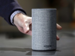 A new Amazon Echo is displayed during a program announcing several new Amazon products by the company, in Seattle on Sept. 27, 2017. (AP Photo/Elaine Thompson)