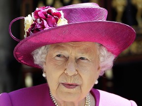 Britain's Queen Elizabeth II leaves after opening The Queen's Diamond Jubilee Galleries at Westminster Abbey in London, Friday, June 8, 2018. (AP Photo/Kirsty Wigglesworth)