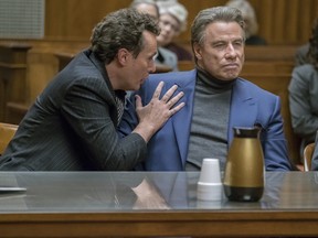 This image released by Vertical Entertainment shows John Travolta in a scene from "Gotti." (Brian Douglas/Vertical Entertainment via AP)