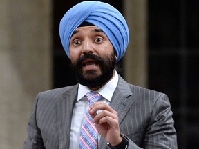 Minister of Innovation, Science and Economic Development Navdeep Bains rises during Question Period in the House of Commons on Parliament Hill in Ottawa on Tuesday, May 29, 2018.