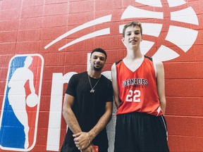Denver Nuggets guard Jamal Murray, left, poses for a photo with Olivier Rioux, 12, in St. Catharines, Ont., in this recent handout photo. (The Canadian Press)