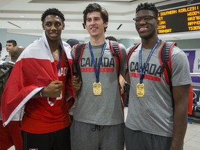 Canada Basketball arrive at Toronto Pearson International Airport after winning the U19M FIBA World Cup Championships on Monday July 10, 2017.  From left - R.J. Barrett, Danilo Djuricic, and Amidou Bamba. (Ernest Doroszuk/Toronto Sun/Postmedia Network)