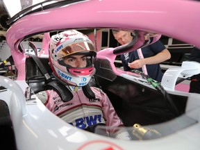 Canada's Nicholas Latifi, from Toronto, is fitted for his Force India seat at the Canadian Grand Prix Thursday, June 7, 2018 in Montreal. (The Canadian Press/Tom Boland)