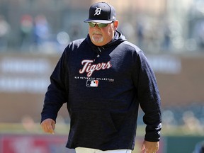 In an April 20, 2018 file photo Detroit Tigers pitching coach Chris Bosio walks to the dugout during a game against the Kansas City Royals in Detroit. (AP Photo/Carlos Osorio, File)