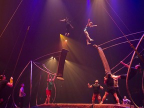 Performers rehearse the 'swing to swing' part of the show before a dress rehearsal for the Toronto opening of Cirque Du Soleil's latest creation 'Luzia' on July 27, 2016.
