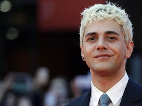 Actor and director Xavier Dolan poses for photos on the red carpet of the 12th edition of the Rome Film Fest, in Rome, Friday, Oct. 27, 2017. Montreal actor-filmmaker Dolan has joined the cast of the Toronto-shot horror film "It: Chapter Two." THE CANADIAN PRESS/AP/Andrew Medichini