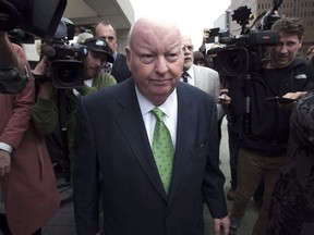 Sen. Mike Duffy leaves the courthouse after being acquitted on all charges Thursday, April 21, 2016 in Ottawa.