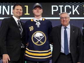 Rasmus Dahlin poses after being selected first overall by the Buffalo Sabres during the first round of the 2018 NHL Draft at American Airlines Center on June 22, 2018 in Dallas, Texas.