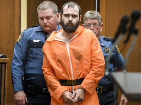 Steven Wiggins walks into the Circuit Court to be arraigned in the killing of Dickson County Sgt. Daniel Baker at the Dickson County Courthouse in Charlotte, Tenn., Friday, June 8, 2018. (Lacy Atkins/The Tennessean via AP)