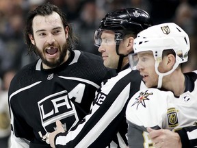 Los Angeles Kings defenceman Drew Doughty reacts after getting hit with a stick by Vegas Golden Knights' Jonathan Marchessault in Los Angeles, Sunday, April 15, 2018. (AP Photo/Chris Carlson)