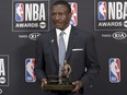 Dwane Casey, current head coach of the Detroit Pistons, poses in the press room with the coach of the year award for his work with the Toronto Raptors at the NBA Awards on Monday, June 25, 2018, at the Barker Hangar in Santa Monica, Calif. (Photo by )