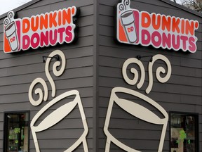 A Dunkin' Donuts restaurant in Pittsburgh Friday, Feb. 23, 2018. (AP Photo/Gene J. Puskar)