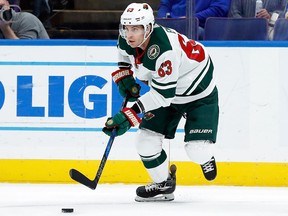 In this Nov. 25, 2017, file photo, Minnesota Wild's Tyler Ennis controls the puck during the first period of an NHL hockey game against the St. Louis Blues in St. Louis.