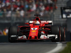 Sebastian Vettel drives the Scuderia Ferrari SF70H on track during the Canadian Grand Prix at Circuit Gilles Villeneuve on June 11, 2017 in Montreal. (Clive Mason/Getty Images)