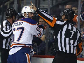 Edmonton Oilers forward Benoit Pouliot can't believe the call from referee Garrett Rank during NHL action against the Jets in Winnipeg on Thu., Dec. 1, 2016. (Kevin King/Winnipeg Sun)