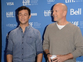 Joseph Gordon-Levitt and Bruce Willis pose at the 'Looper' photo call during the 2012 Toronto International Film Festival at TIFF Bell Lightbox on September 6, 2012 in Toronto. (Jason Merritt/Getty Images)