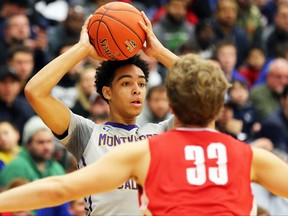 Andrew Nembhard of Montverde Academy looks to pass the ball in a game against Mater Dei High School during the 2018 Spalding Hoophall Classic at Blake Arena at Springfield College on January 15, 2018 in Springfield, Massachusetts. (Adam Glanzman/Getty Images)