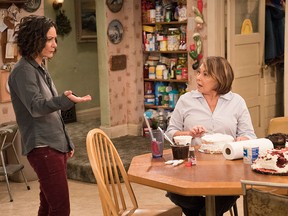 This image released by ABC shows Sara Gilbert, left, and Roseanne Barr in a scene from "Roseanne."