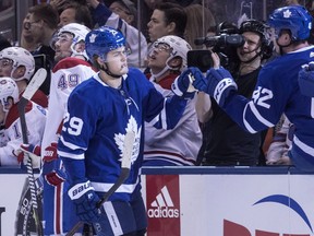 Toronto Maple Leafs William Nylander celebrates at the team benchafter scoring his team's opening goal against Montreal Canadiens during first period NHL hockey action in Toronto, on Saturday, March 17, 2018. THE CANADIAN PRESS/Chris Young