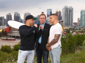UFC fighters Eddie Alvarez (L) and Dustin Poirier (R) face off Wednesday 30, 2018 overlooking the Calgary skyline during a media tour to promote the upcoming fight night July 28. Jim Wells/Postmedia