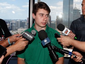 Quintin Hughes talks to the media in Dallas, Thursday, June 21, 2018. The NHL Draft takes place Friday and Saturday in Dallas.